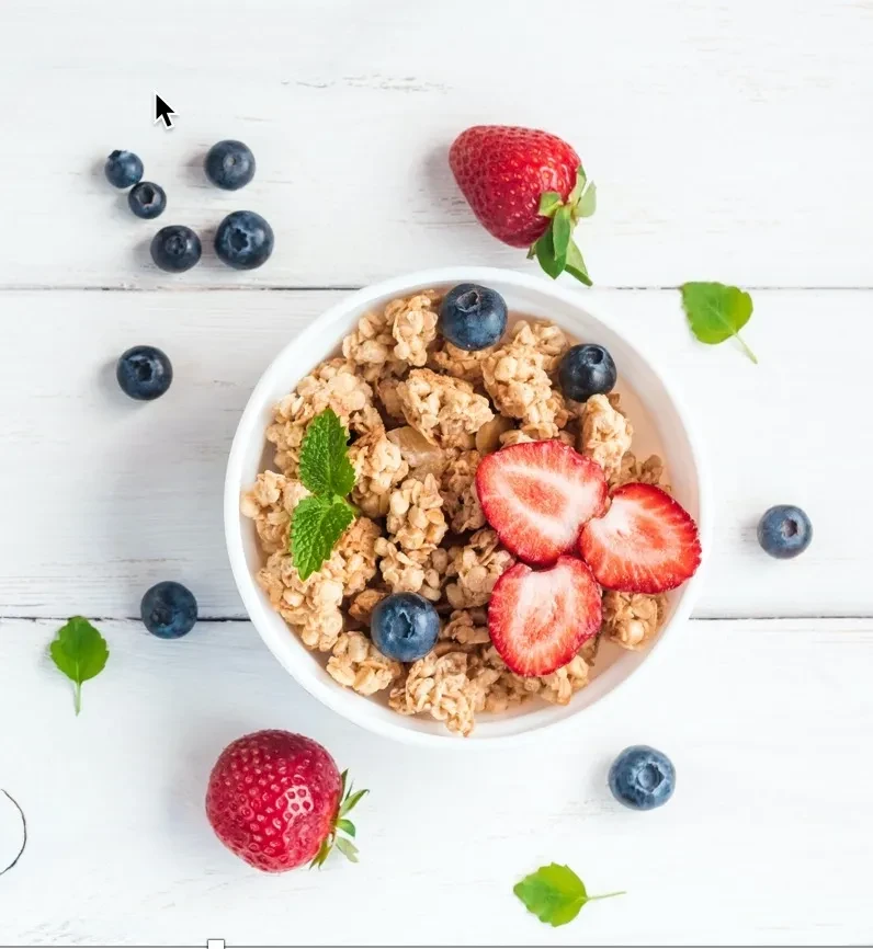 Berry bowl with granola, strawberries and blueberries